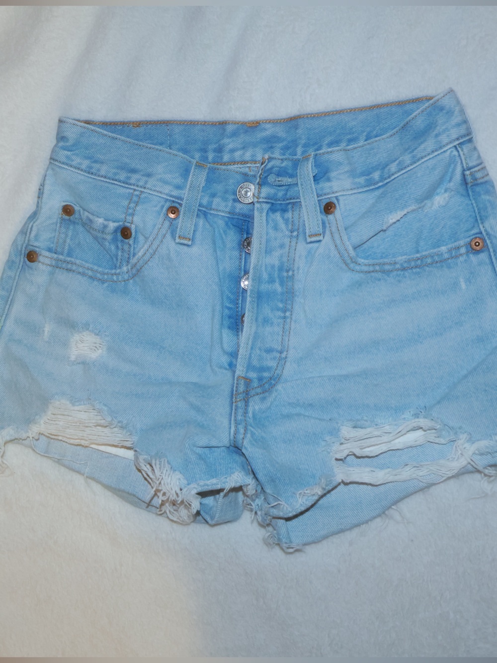 Levi's 501 Light Blue Distressed Denim Shorts